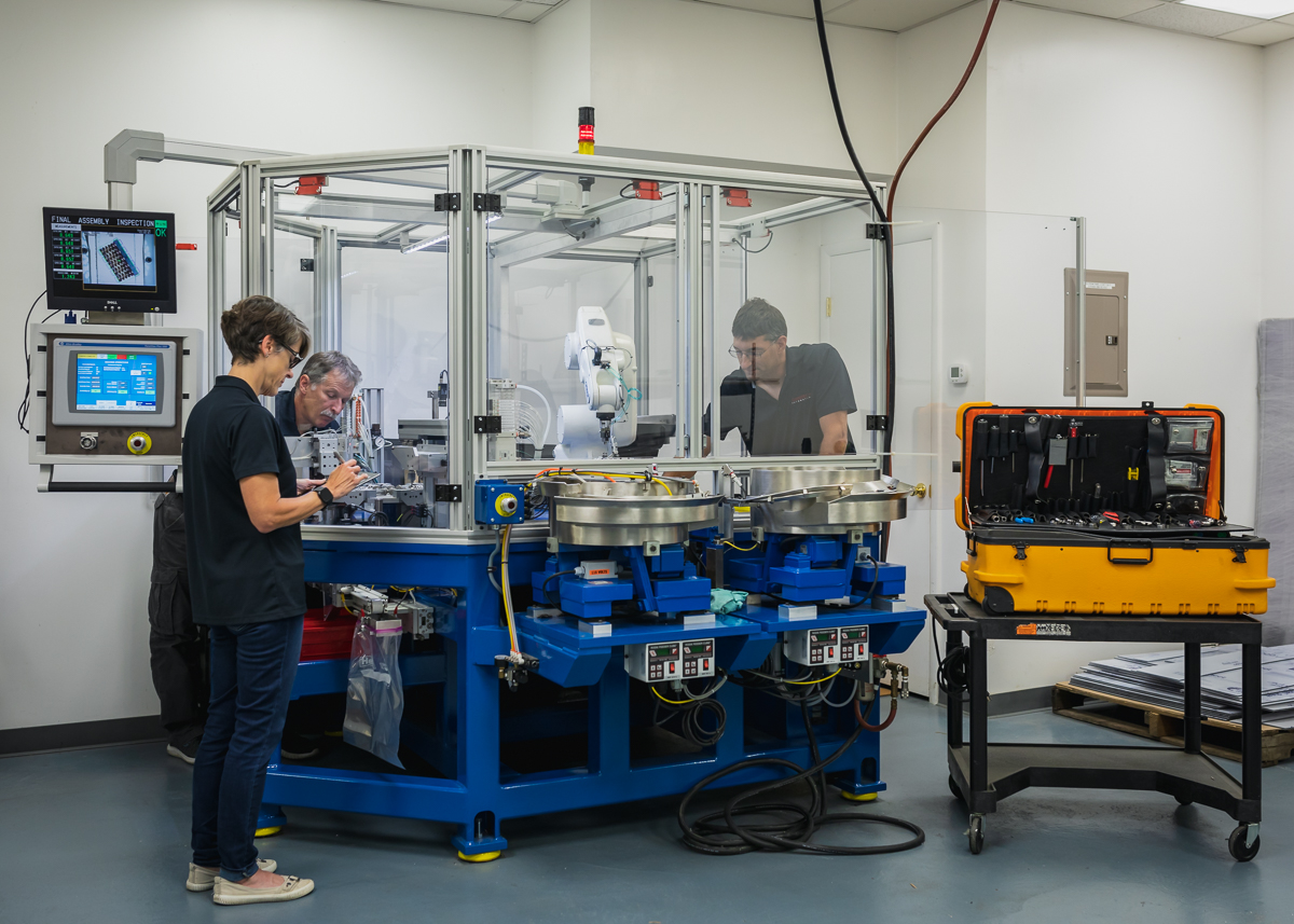 Team of engineers installing equipment