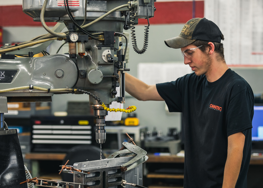 Technician working on a drill bit